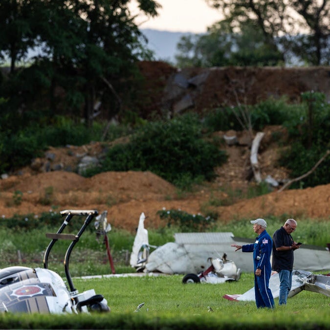 Pilot killed as plane collides with police helicopter at airport, officials say