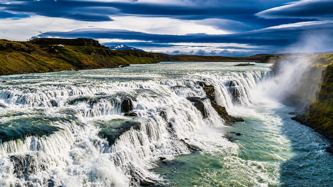 Powerful waterfalls rush through Iceland’s rugged volcanic landscape