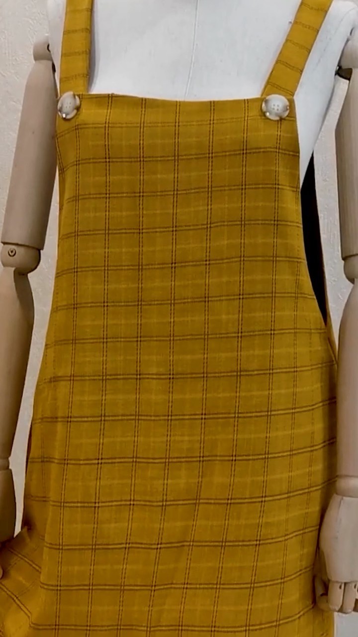 How buttoned strap dresses refresh everyday style