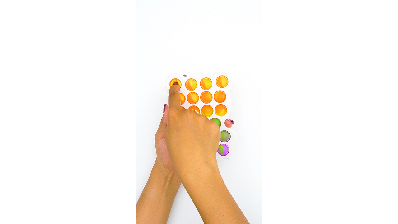 Colorful dimple pops create a crisp satisfying sensory sequence