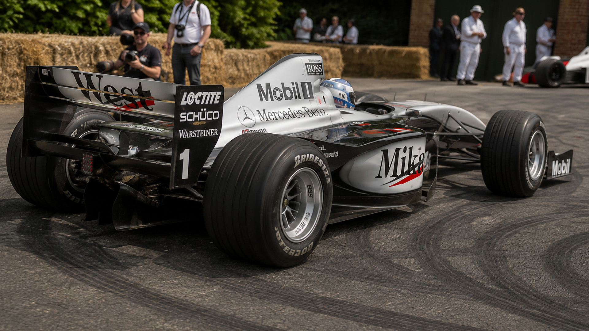 McLaren MP4 14 returns to the Goodwood course