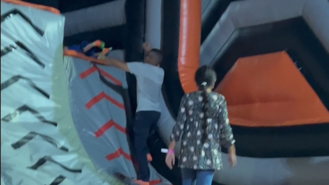 Child's hilarious slide mishap resembles a cartoon moment