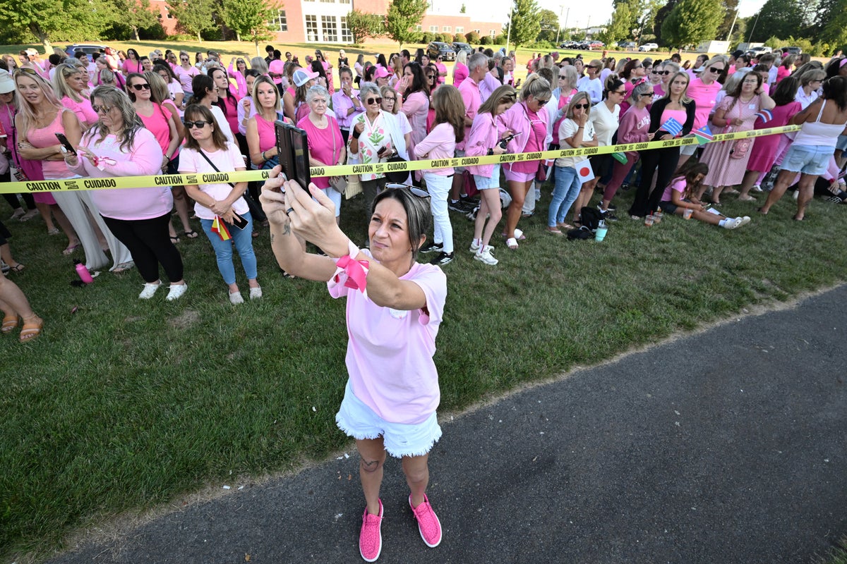 Women in pink rally in support of Lindsay Clancy who is on trial for ...
