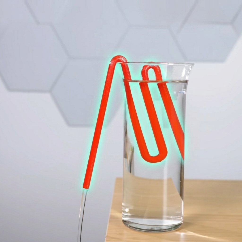 A tube starts a siphon on its own