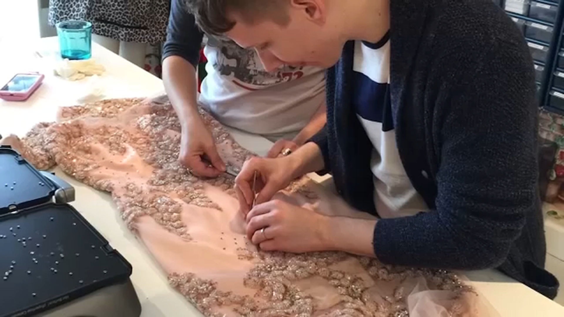 NC man reflects on helping create some of Dolly Parton's fashionable, sparkly looks