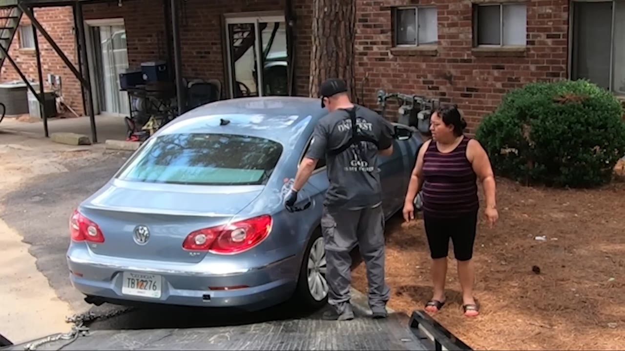 One parking violation. One lethal threat sticker. One very awkward tow.