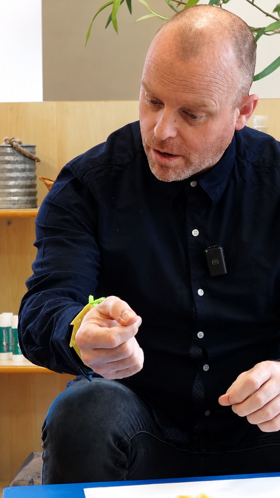 Tiny Tim makes bracelets with kids