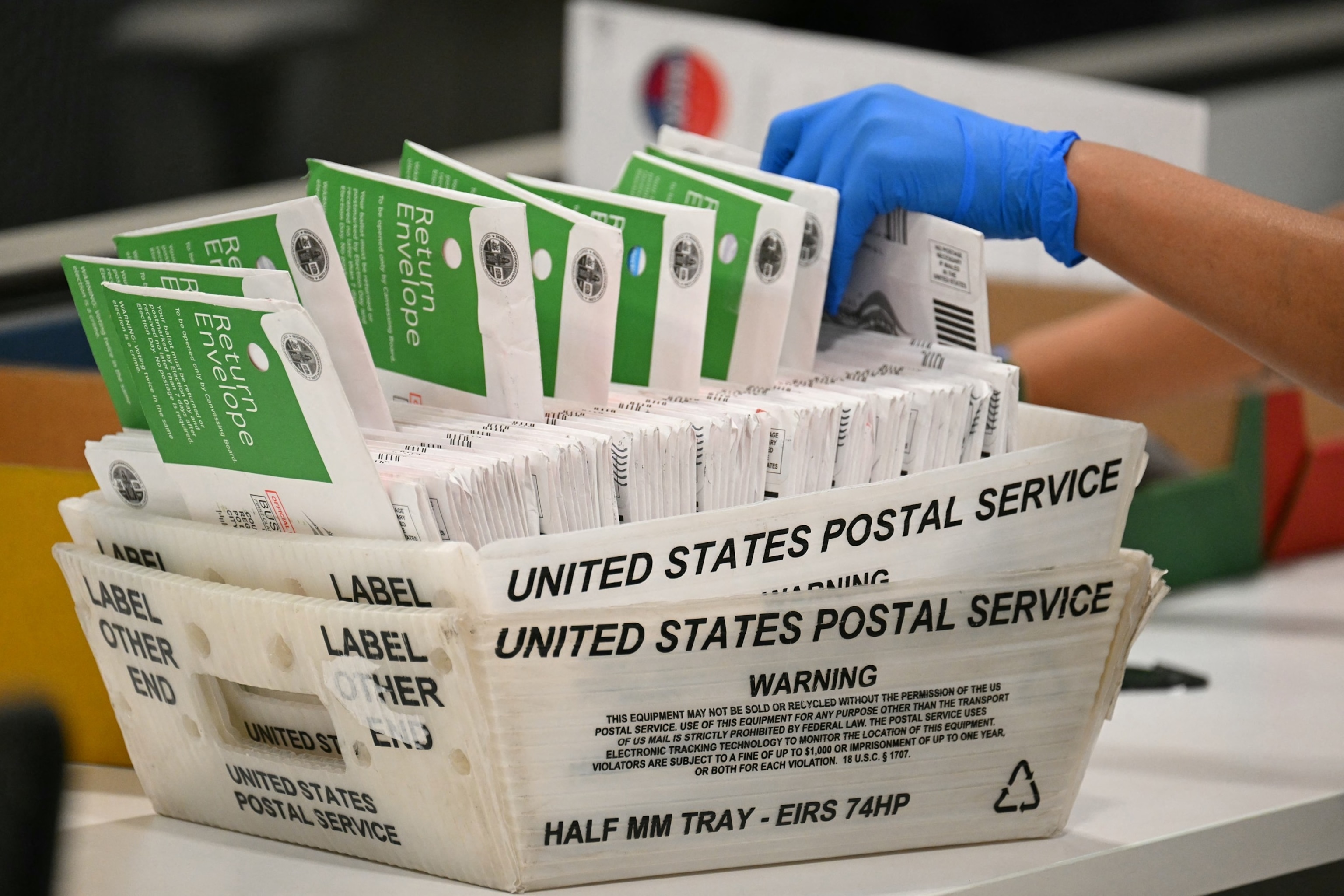 Judge temporarily blocks Trump administration's attempt to restrict mail-in voting