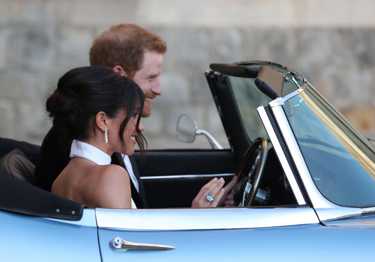 Meghan wears Princess Diana's ring on her 2018 wedding day. (Image credit: Getty Images)