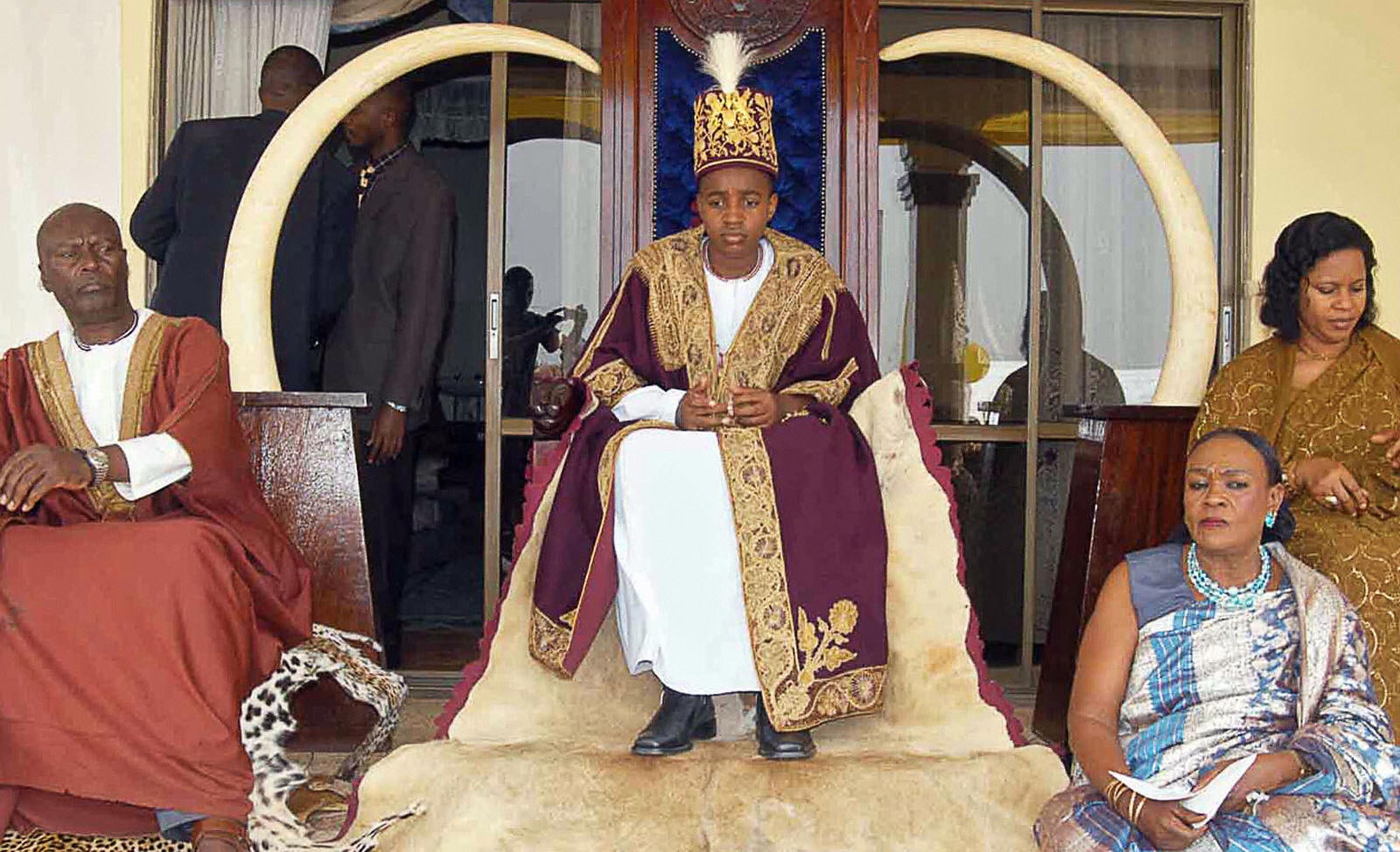 King Oyo, centre, at the 10th anniversary of his coronation (AFP/Getty)