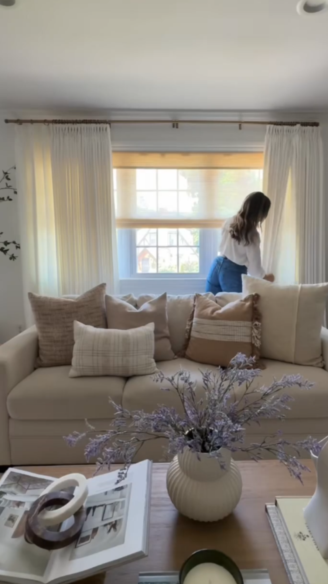 Neutral drapes create a timeless living space