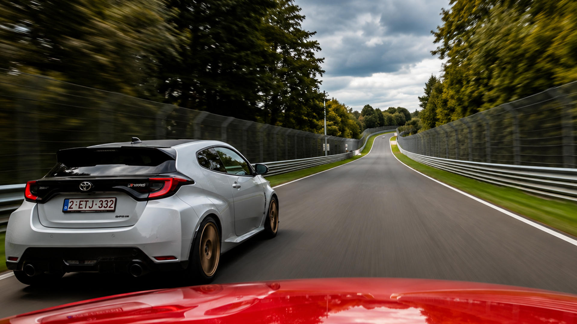 A Toyota GR Yaris Blasts Past the Driver at Nurburgring