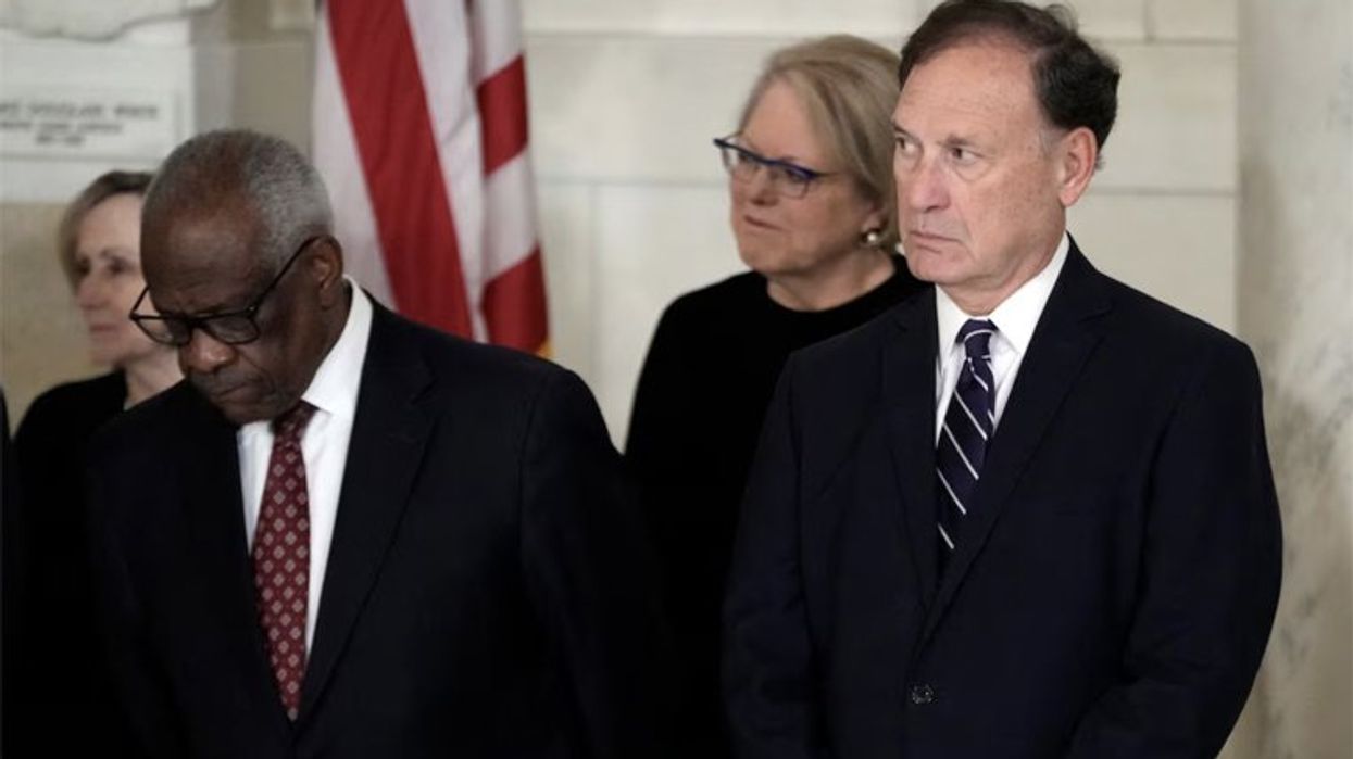 Supreme Court Justice Clarence Thomas and Justice Samuel Alito attend a private ceremony for retired Supreme Court Justice Sandra Day O’Connor before public repose in the Great Hall at the Supreme Court in Washington, Monday, Dec. 18, 2023. Jacquelyn Martin/Pool via REUTERS/