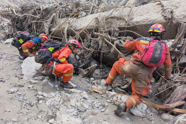 Nepal-China flood survivors reach safe areas as families await news of ...
