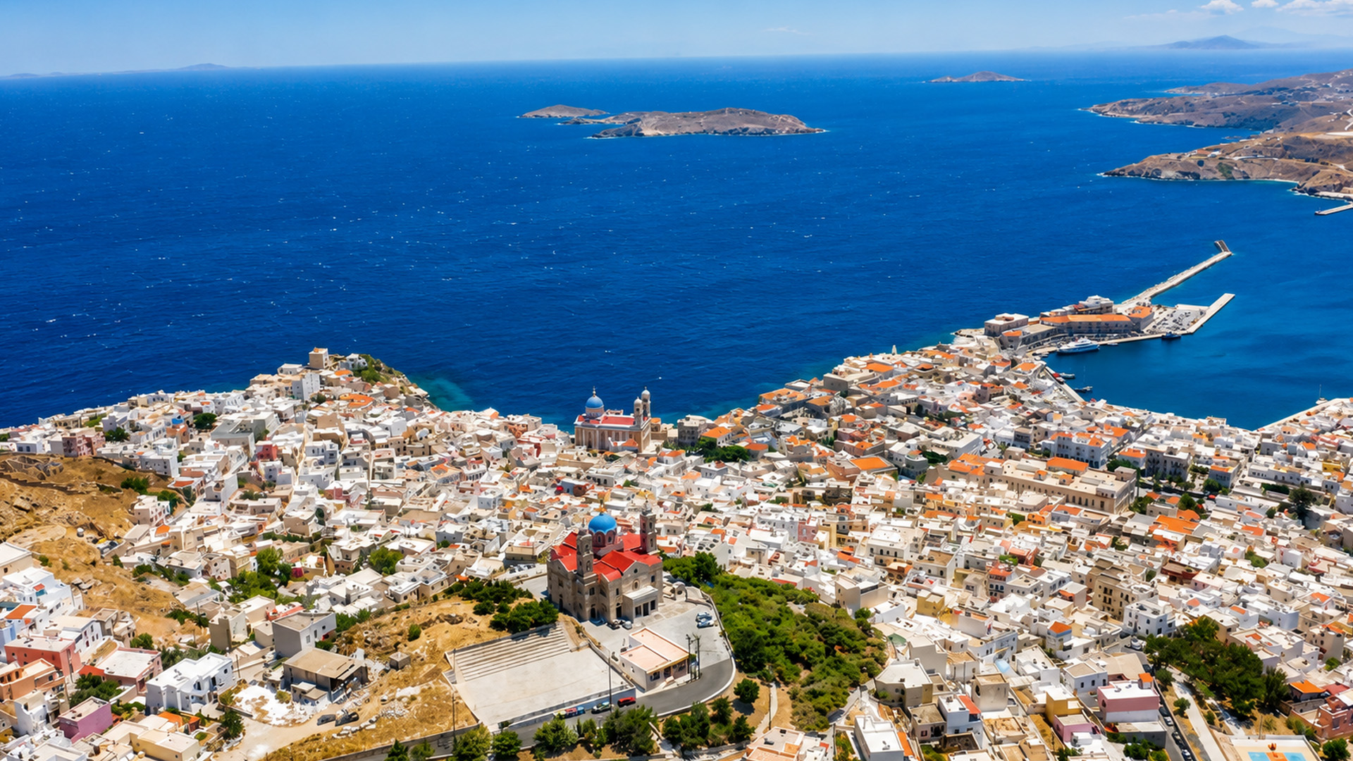 White buildings cover nearly every available hillside