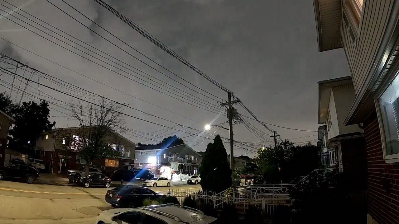 Powerful thunderstorm lights up the night sky over Queens