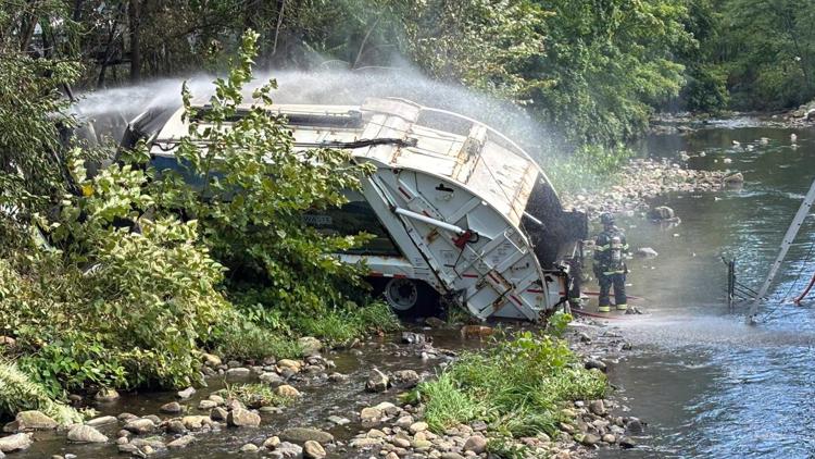2 hospitalized after fiery garbage truck crash into Bristol River