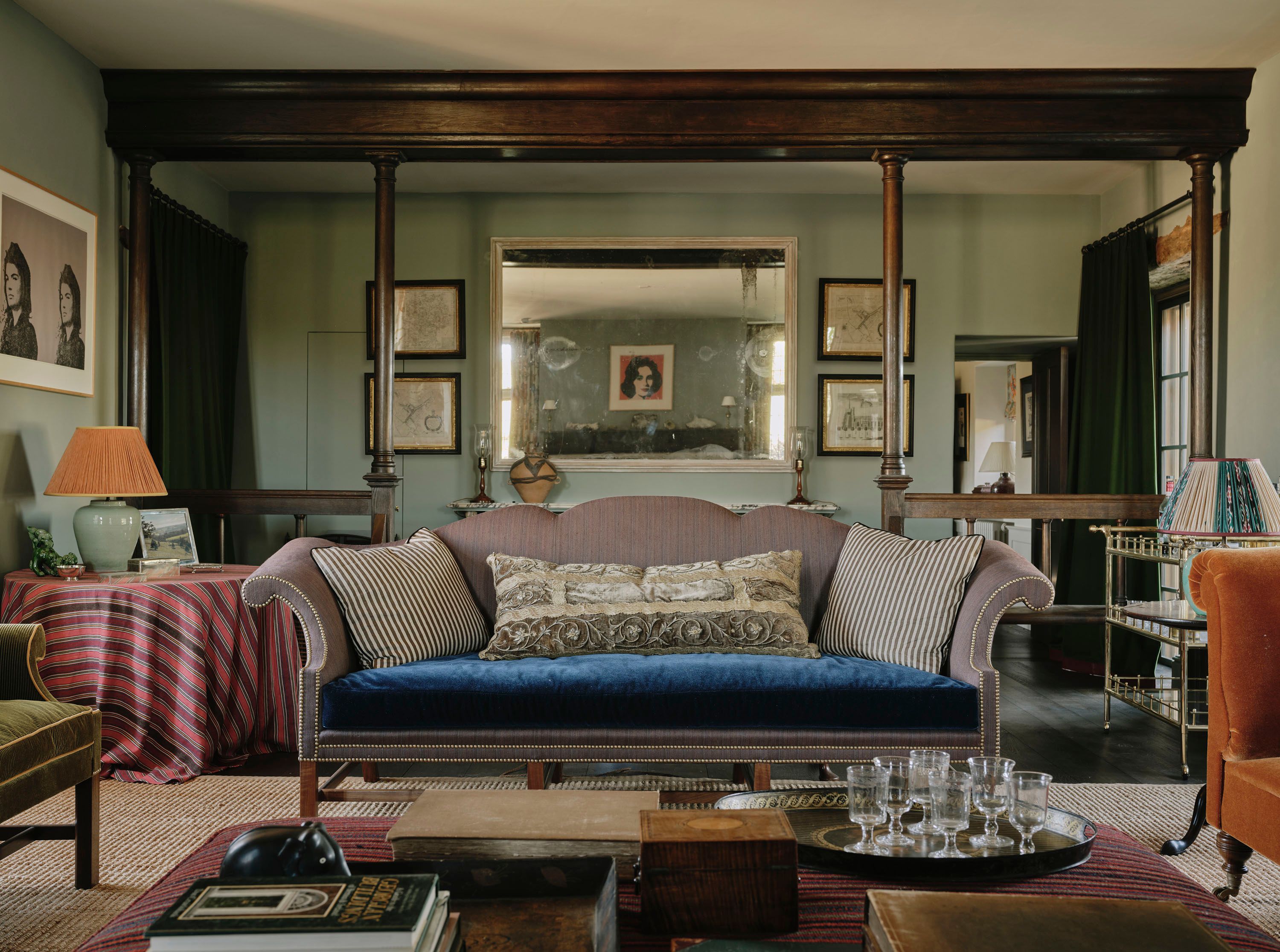 Deep window seats and cozy reading nooks heighten the magic of this English farmhouse