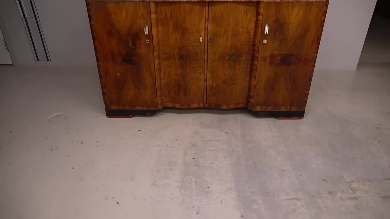 Watch the first steps of restoring this damaged antique display cabinet