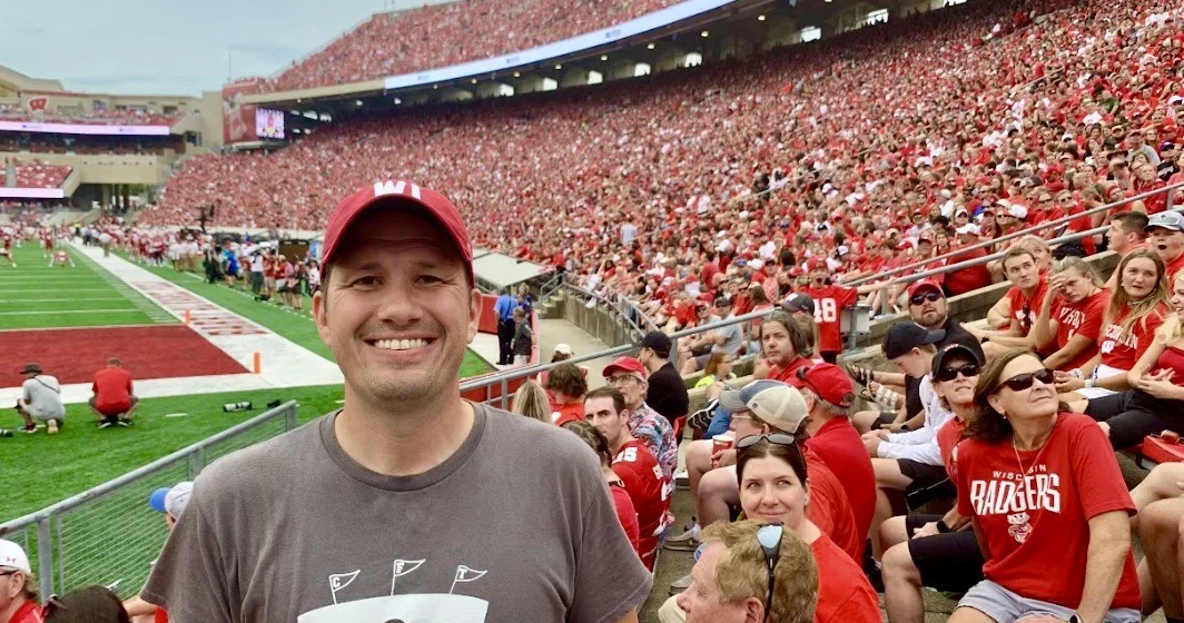 Gay college football fan celebrates ‘open and proud' visibility on quest to visit all NCAA stadiums