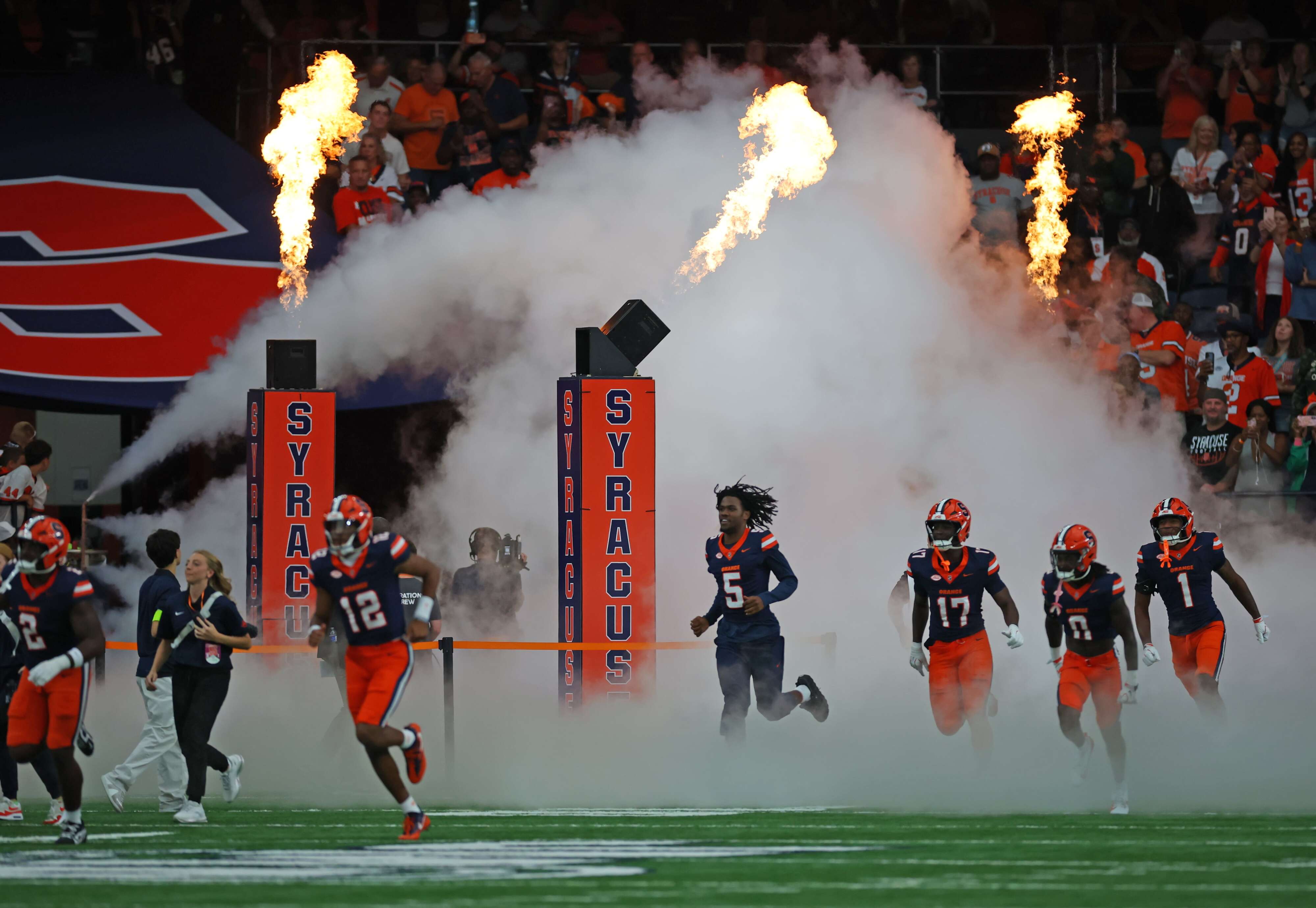 What was attendance for Syracuse football's season opener vs. New Hampshire?