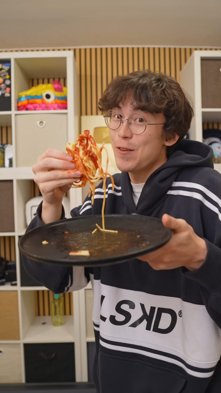 Trying frozen popsicles out of broken spaghetti and ketchup