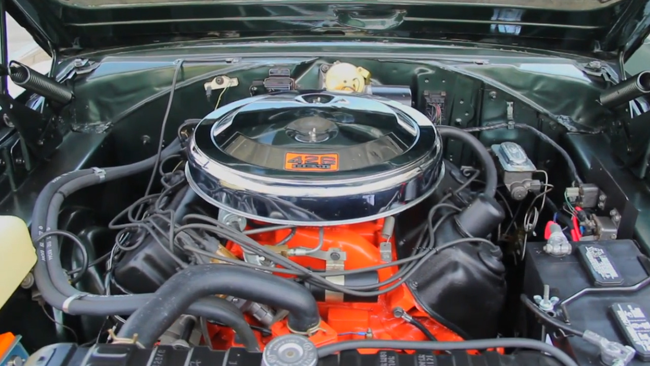 The crazy Hemi engine power inside a classic 1966 Dodge muscle car