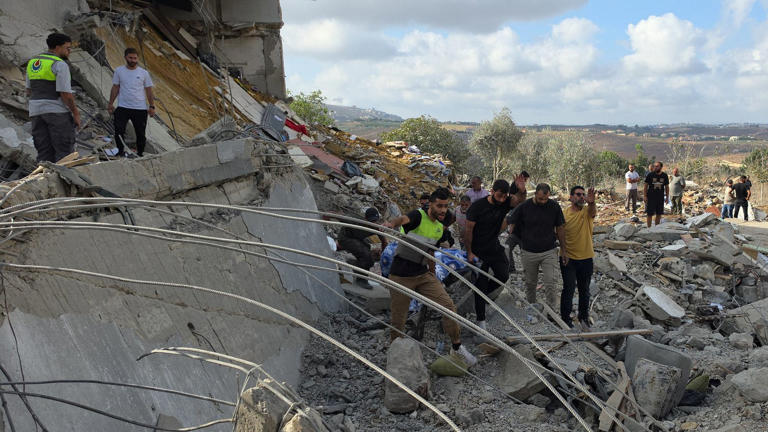 The aftermath of an Israeli strike in Arab Salim. Pic: Reuters