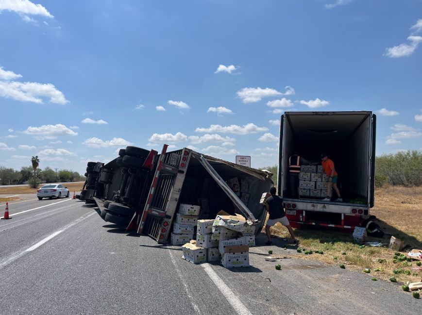 Semi carrying 40,000 pounds of bell peppers flips over on US 281