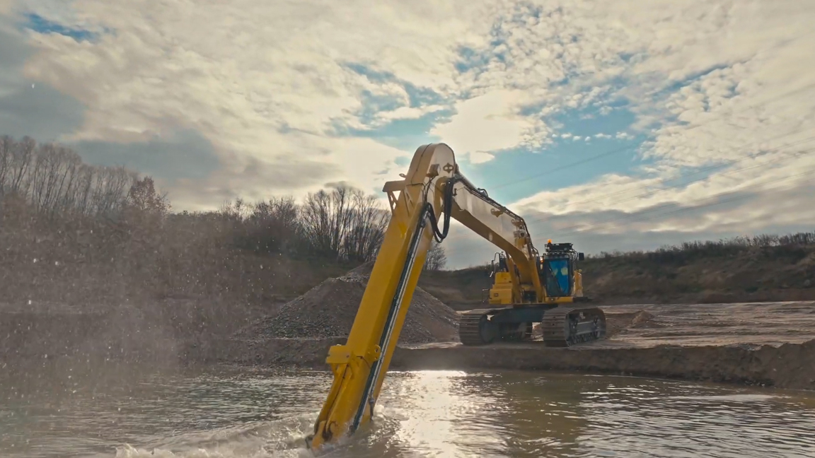 Giant long reach excavator digs deep underwater