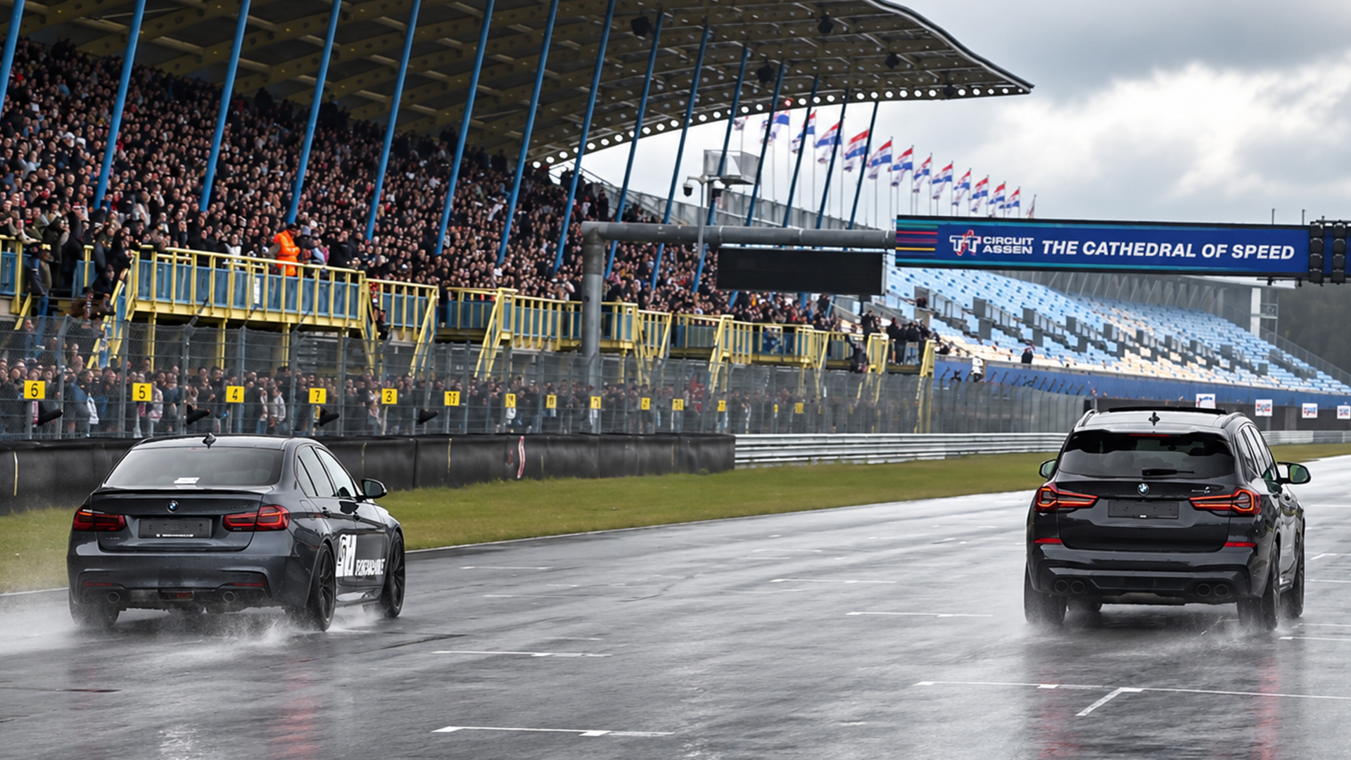 BMW wagon and X3 M send up spray at TT Circuit Assen