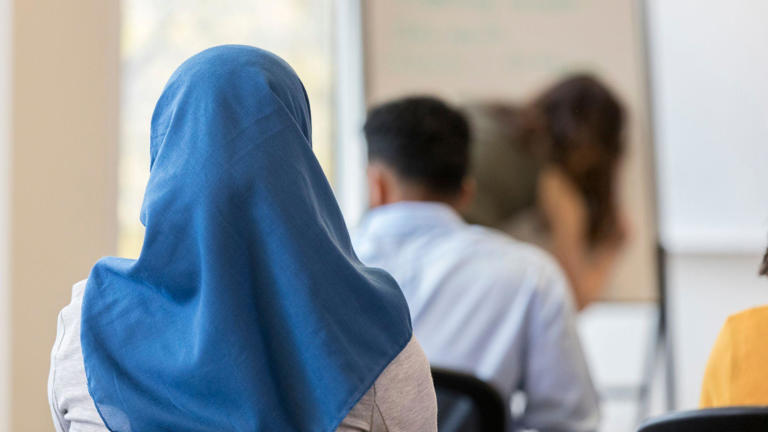 Austria's Islamic headscarf ban in force as under-14s go back to school
