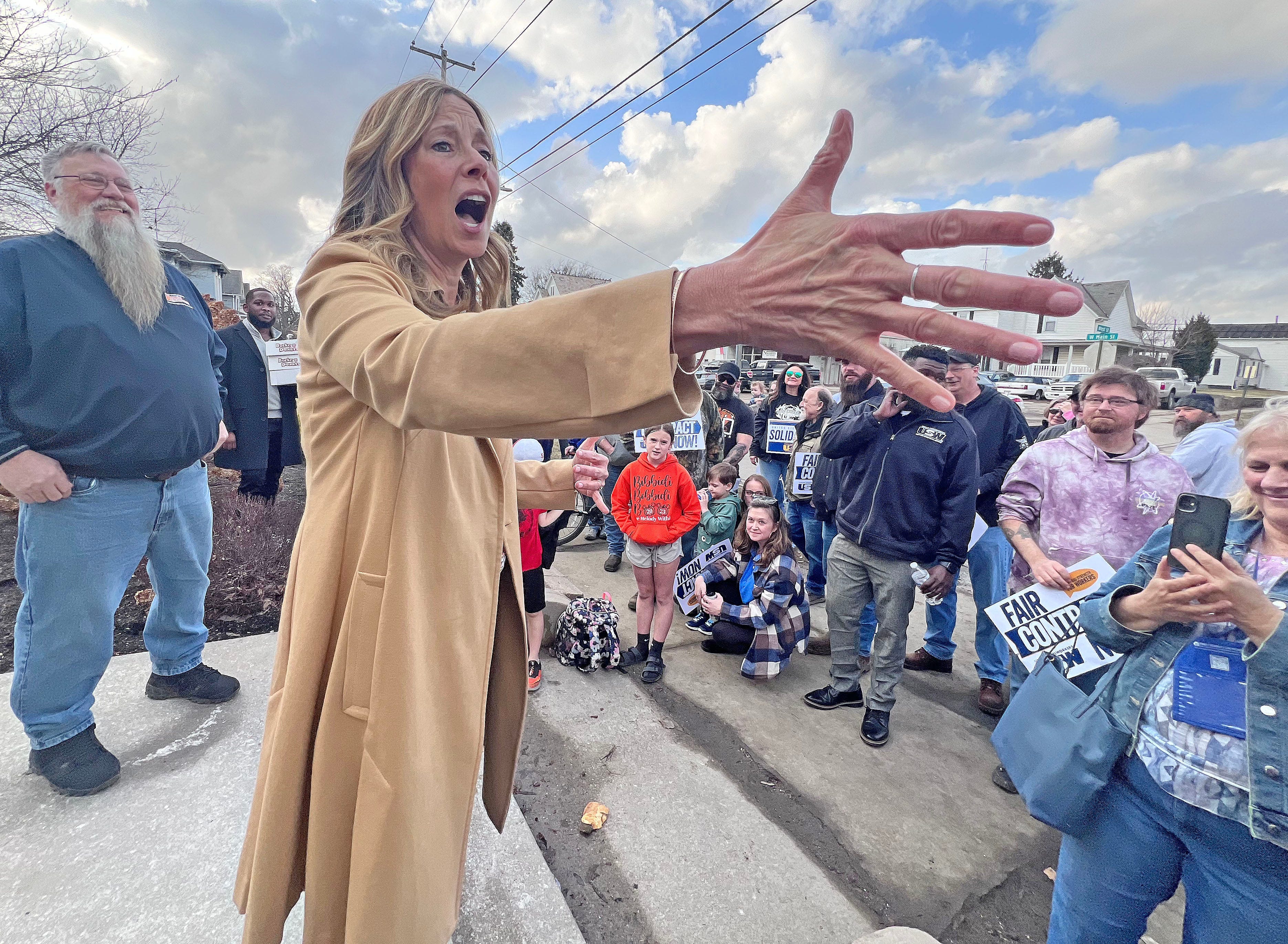 Armed man arrested after charging toward Ohio candidate Amy Acton