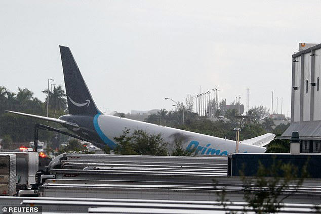The plane caught on fire as a result of the crash and killed five as it collided into vehicles