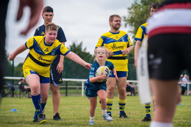Warrington Wolves disability rugby team receives £500 boost from ...