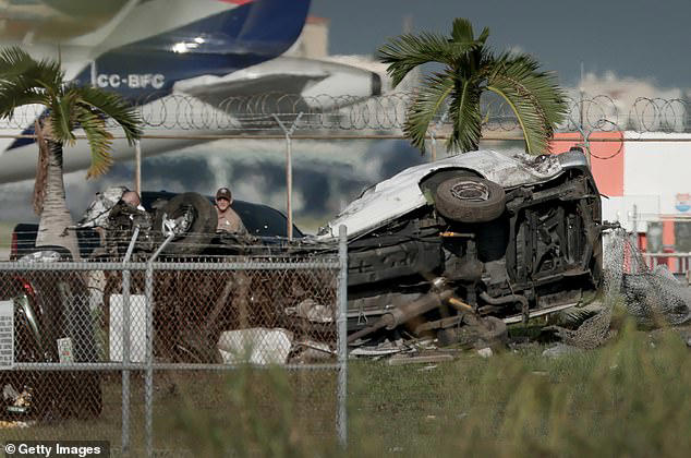 The plane crashed into multiple vehicles after it overran the runway, leaving them 'mangled'