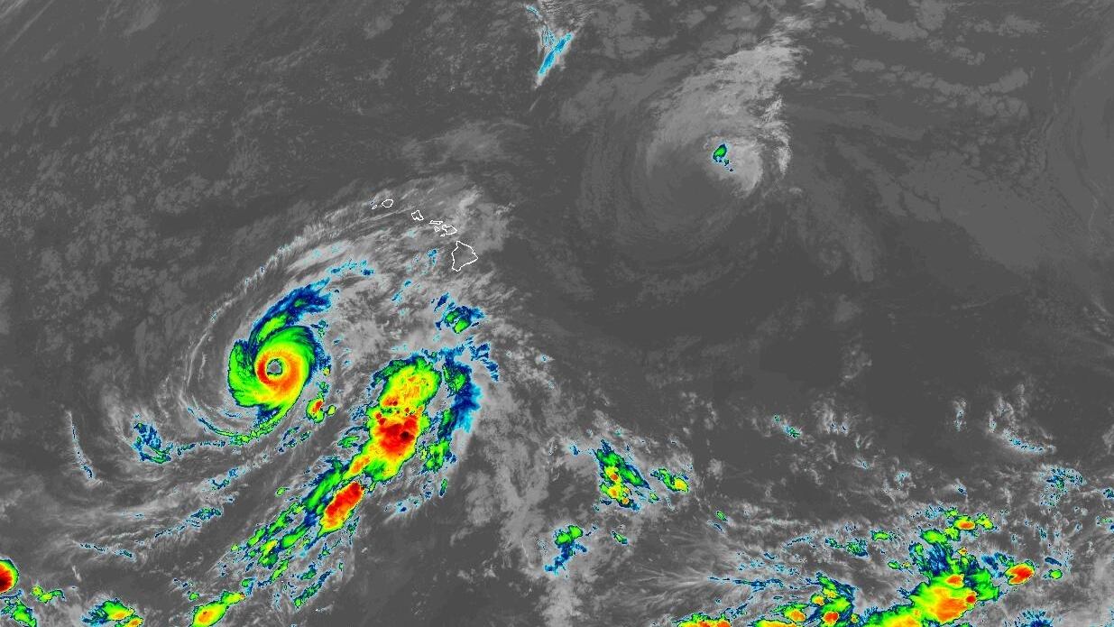 Hurricane Lowell turns north, Kauai County under tropical storm warning