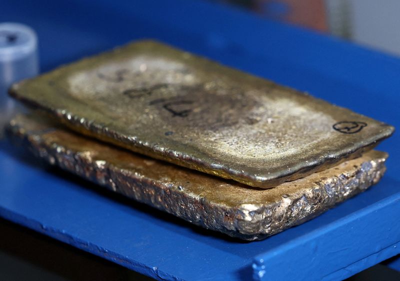 Gold eases as strong US jobs data boosts Fed rate-hike bets