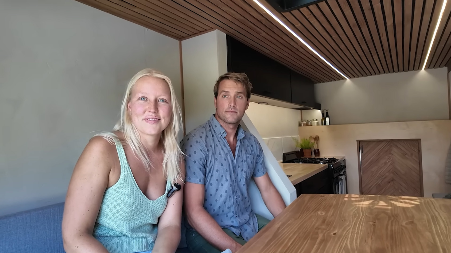 Inside a stealth box truck tiny home with a hidden shower