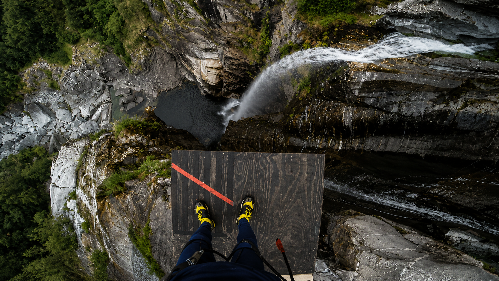 Professional cliff divers use precision and body control on high dives