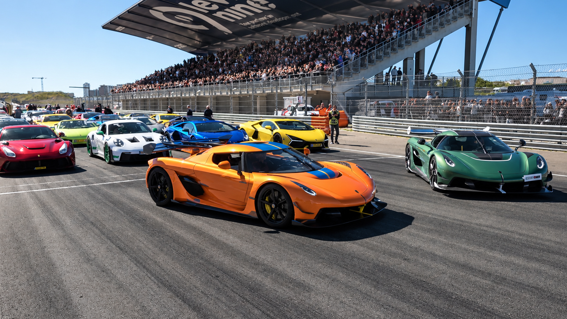 A grid of hypercars lines up at Circuit Zandvoort