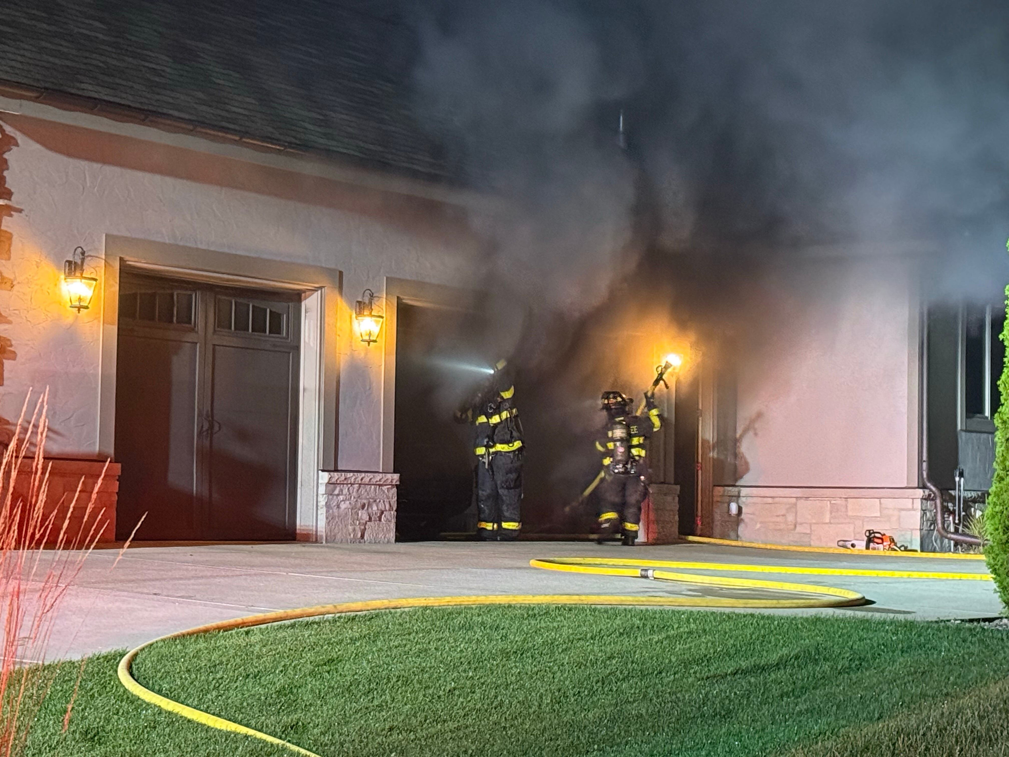 Crews battle garage fire in Town of Westport