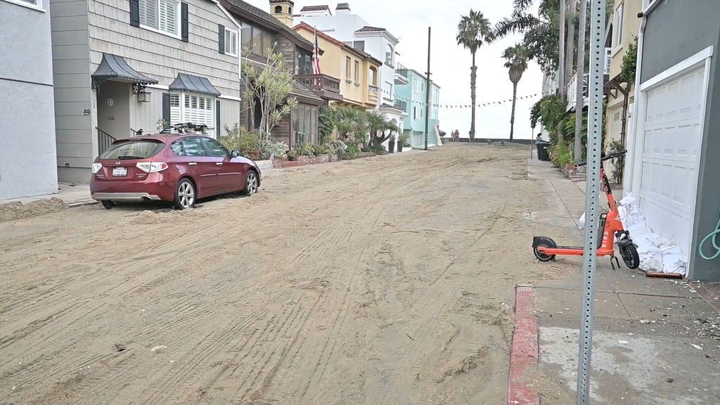 High tide and powerful waves pound Southern California beach communities