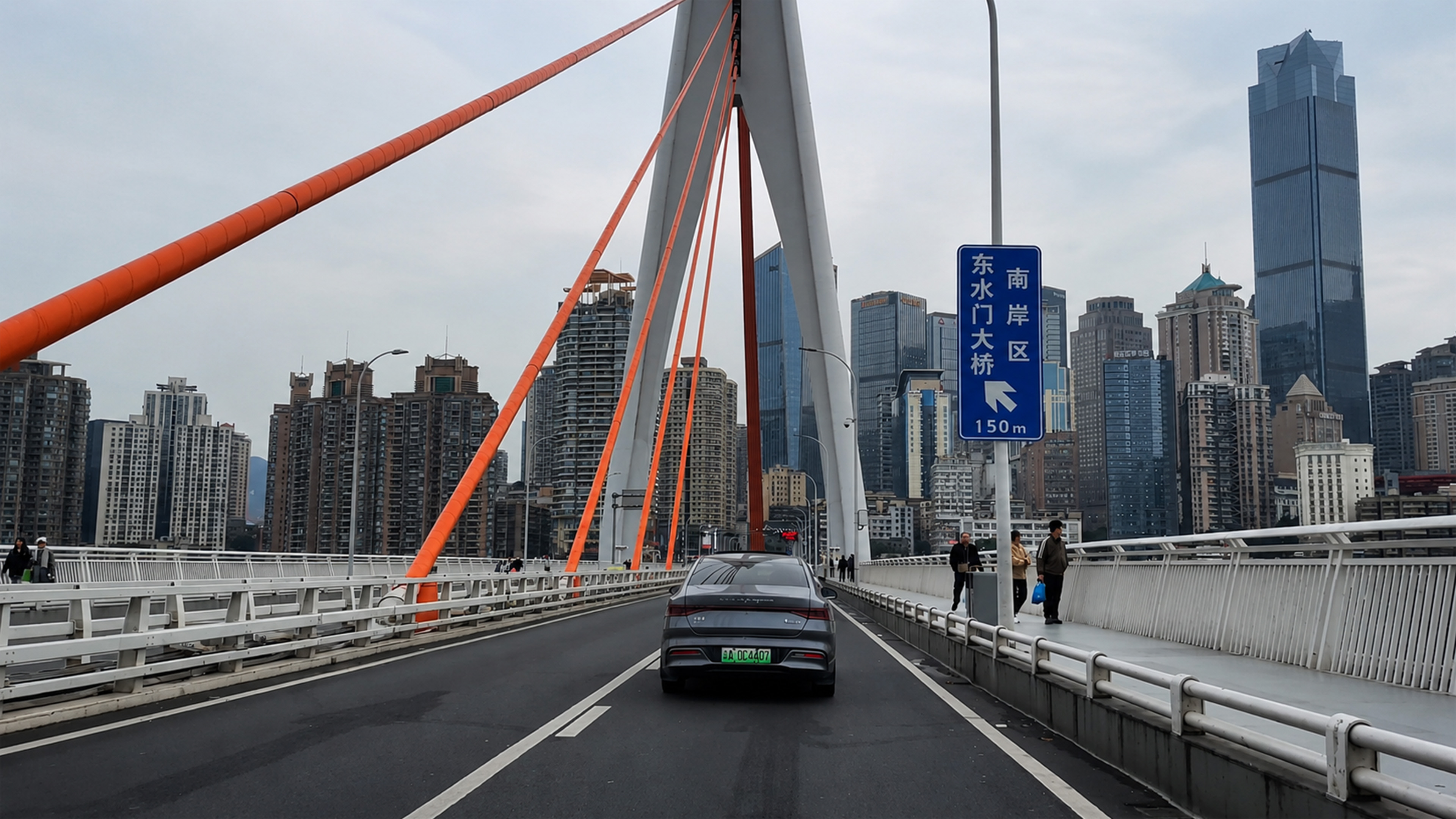 Modern bridge engineering creates a striking gateway into this high ...