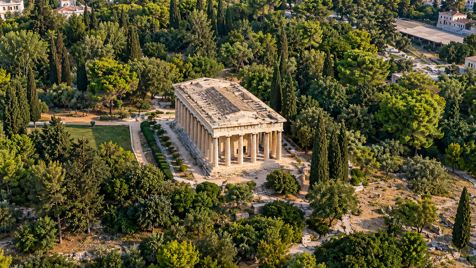 Ancient temple of Hephaestus surrounded by greenery