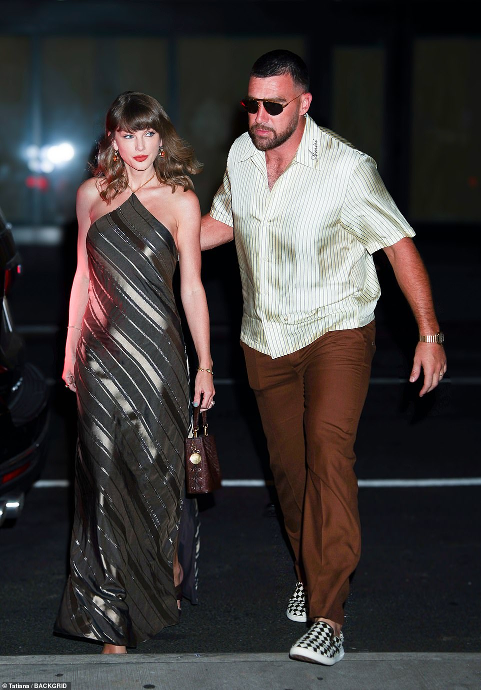 Taylor Swift and Travis Kelce flaunt wedding rings at NYC dinner