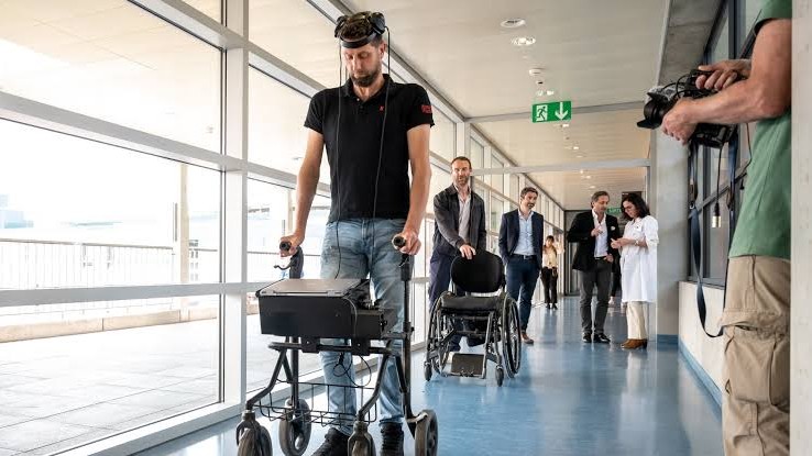 A paralyzed man walked again - immediately after doctors activated his ...