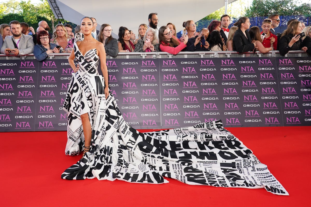 Tulisa wears gown covered in headlines from drug sting scandal at NTAs
