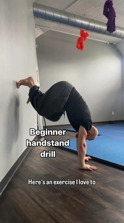 Beginner handstand exercise step-by-step balance training