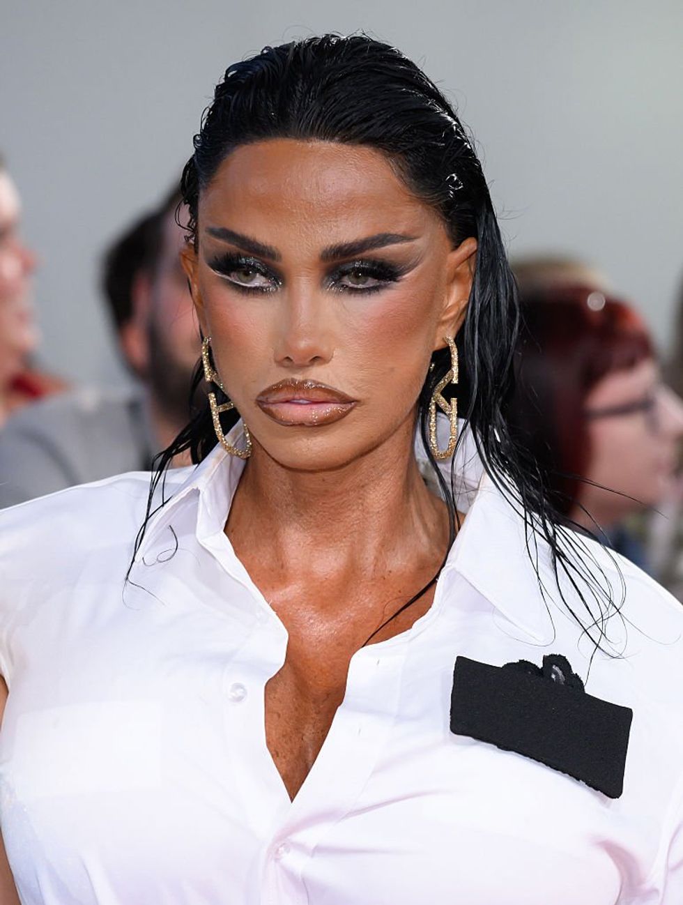 Katie Price Turns Heads As She Steps Out With Junior And Princess Amid 